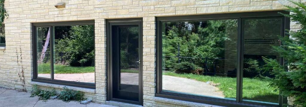 Commercial building with a new door installed by Kindle Windows and Doors LLC.