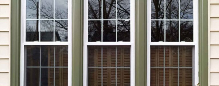 Exterior of a home with new energy efficient windows installed.