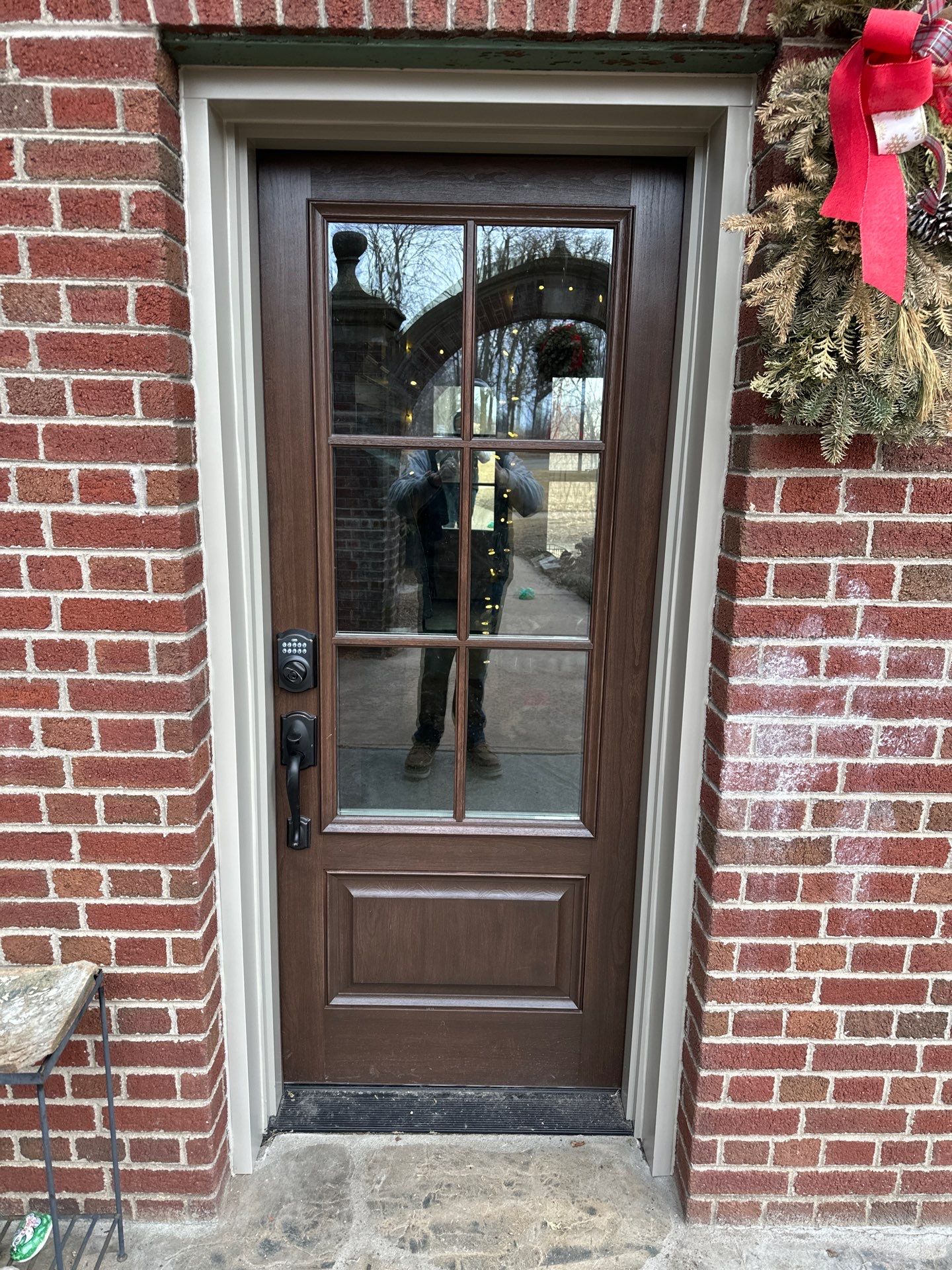 The brand new front door for a home in Greenville Wisconsin done by Kindle Windows & Doors.