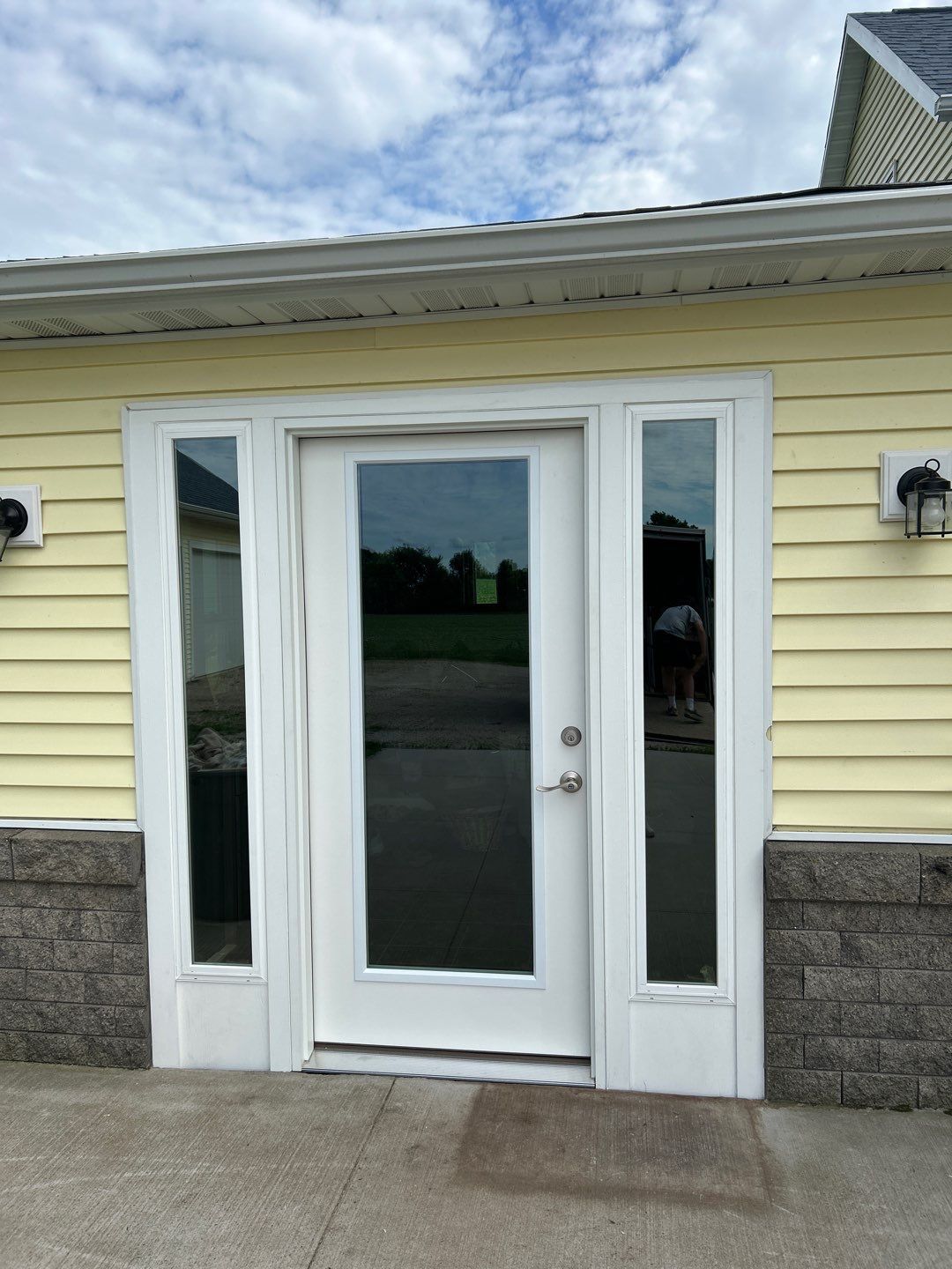 The brand new front door for a home in Greenville Wisconsin done by Kindle Windows & Doors.