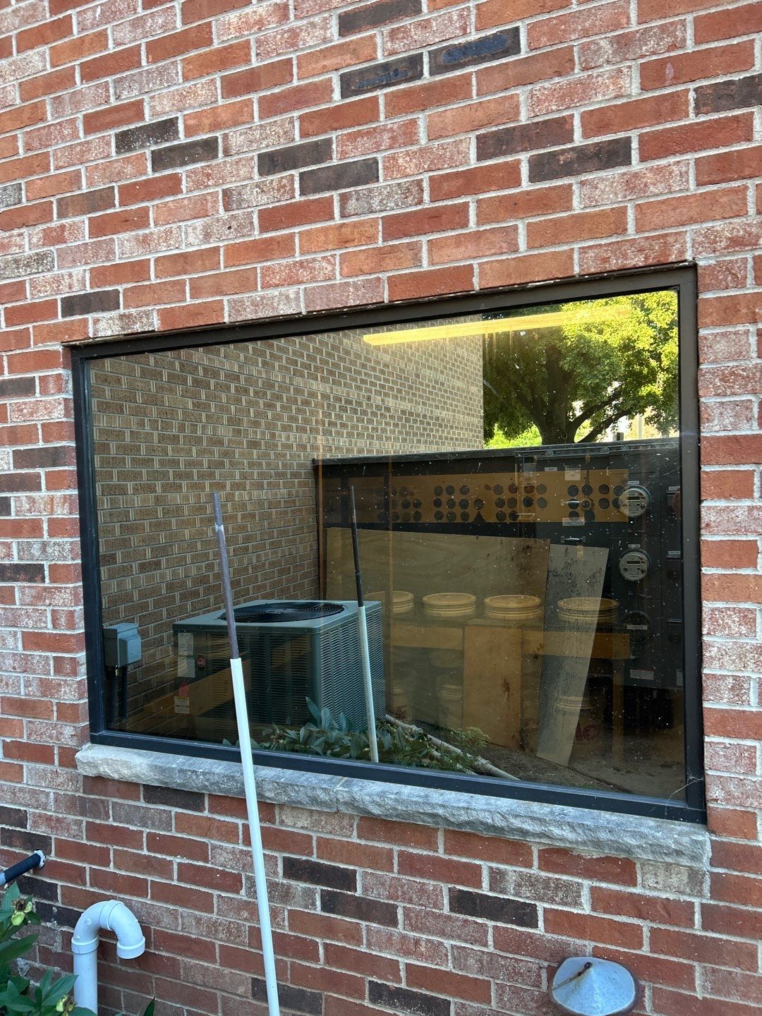 A before shot of a window in Oshkosh WI